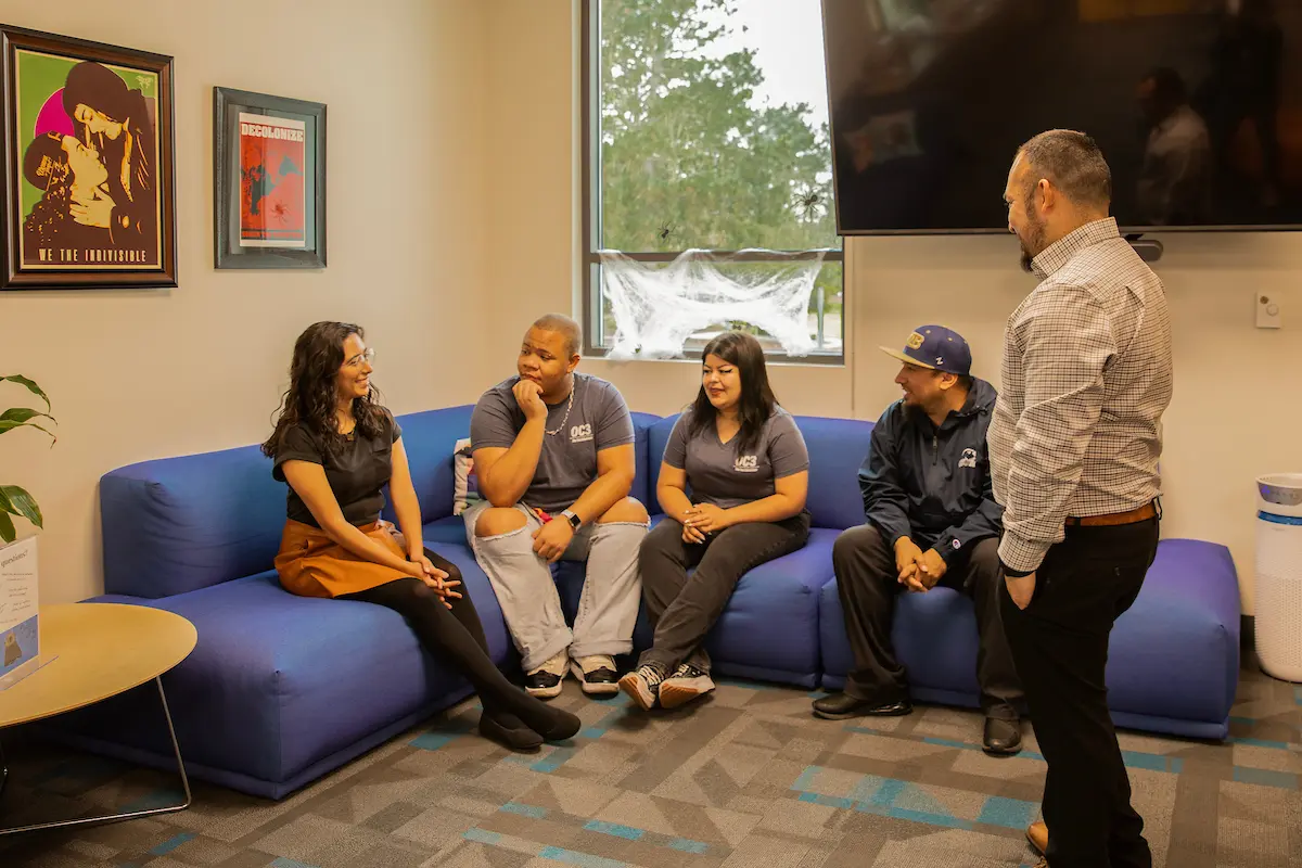 Students and staff meeting in the Otter Cross Cultural center