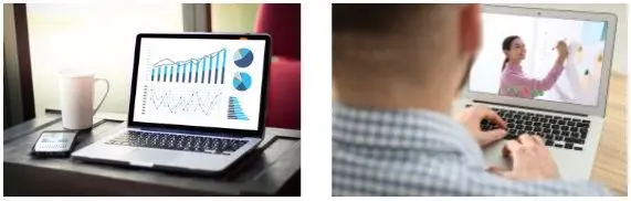 A computer and a person sitting at a computer.