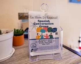 A flyer from El Centro advertising Spanish conversation practice sessions