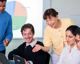 An accounting professor overlooks a classroom of accounting students