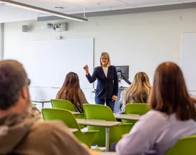 Teacher in front of classroom of students
