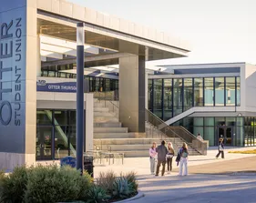 Students outside campus building