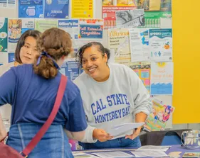 People chatting at open house