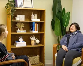 Student at the Personal Growth and Counseling Center talking to a counselor