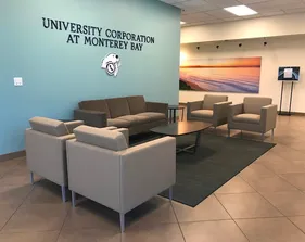 Entrance to Ryan Ranch, lobby seating and logo