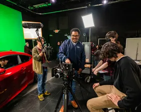 A group of people are filming