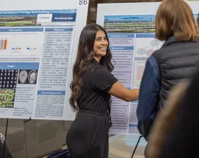 A student giving their capstone presentation