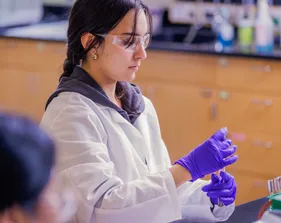 student doing experiment in lab
