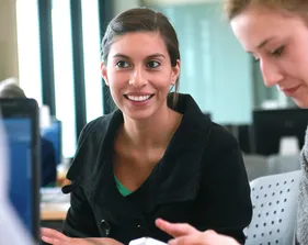 CLC student in library