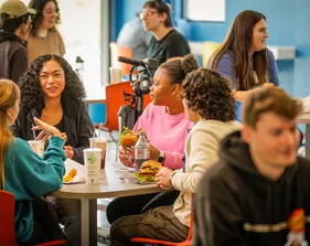 Students sitting at a dining table