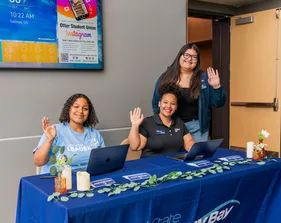 Students at the table of the brunch with the president