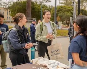 Students visiting a table at Otter Thursday.