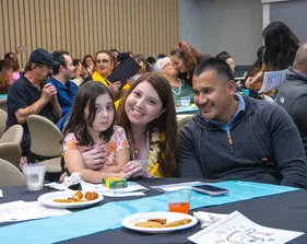 family enjoying ceremony