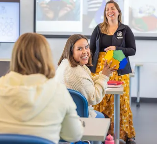 Undergraduate professor and students in classroom