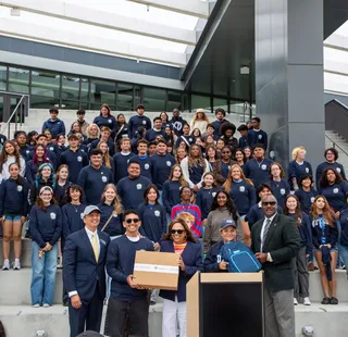 Students from the 2025 Leadership Fellows Cohort standing on the stairs in front of the OSU during the cerimonial handoff
