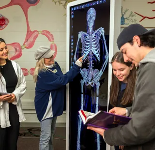 Students looking at a presentation.