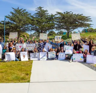 Student Appreciation people holding signs