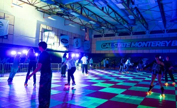 RAFT Weekend, students blacklight skating at the Otter Sports Center
