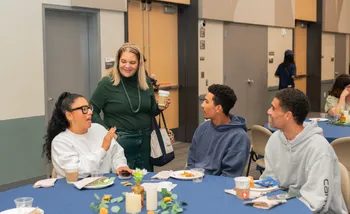 Vanya Quiñones, with student and supporters at Brunch with the President