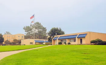 President's office and the flag pole in the center of CSUMB campus