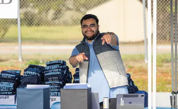 Staff greet transfer students and supporters