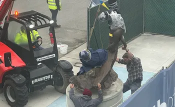 Otter Statue Installation - close up