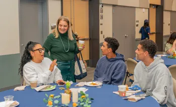 Vanya Quiñones, with student and supporters at Brunch with the President