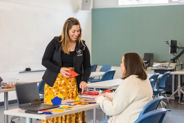 A teacher talking to a student