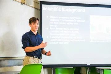 Student giving a scientific presentation