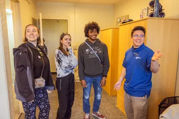 Tour guide giving tour of student dorms