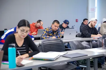 group of students writing