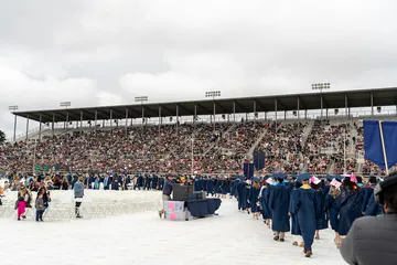 Students walking during commencement