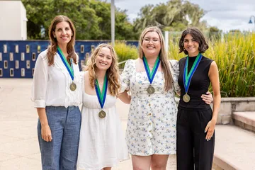 A group of students receiving awards