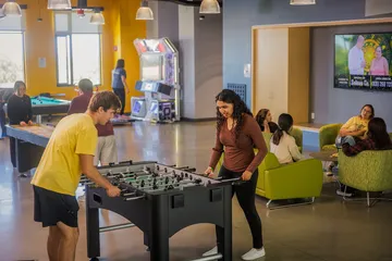 Students in the Rookery Game Room