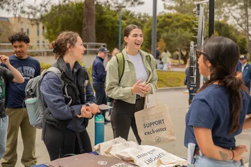 Students visiting a table at Otter Thursday.