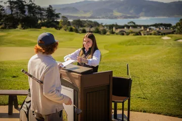 Student checking in to play golf
