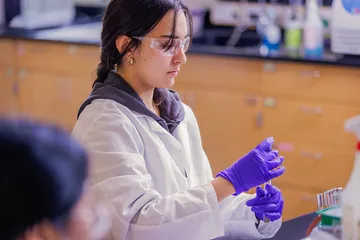 student doing experiment in lab