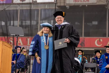 President Quiñones with Honorary degree recipient David L. Stivers at Commencement