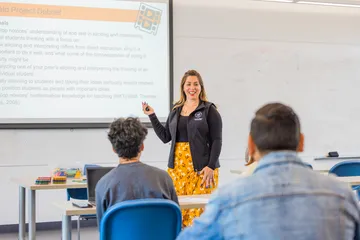 A faculty member giving a presentation