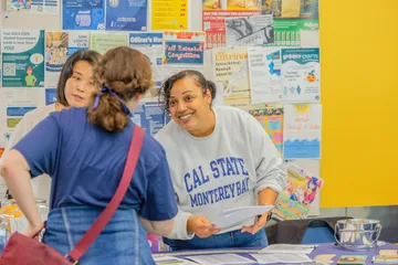 People chatting at open house