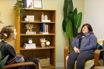 Student at the Personal Growth and Counseling Center talking to a counselor