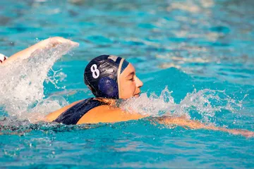 WP athlete, 8, swimming at a Broncos game