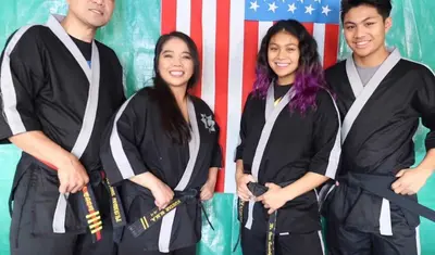 Four members of the martial arts Vanderlipe family, whose Salinas business was helped by CSUMB students