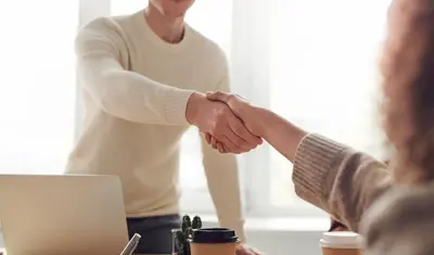 Two people shaking hands