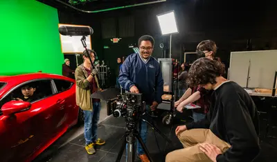 A group of people are filming