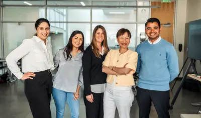 A group of people posing for a photo