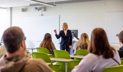 students in a classroom with teacher