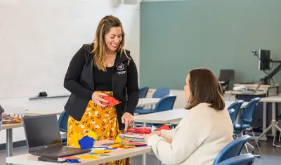 A teacher talking to a student