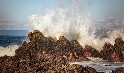 Waves crashing against rocks