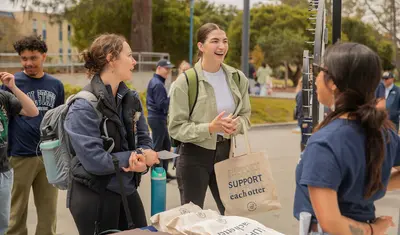 Students visiting a table at Otter Thursday.